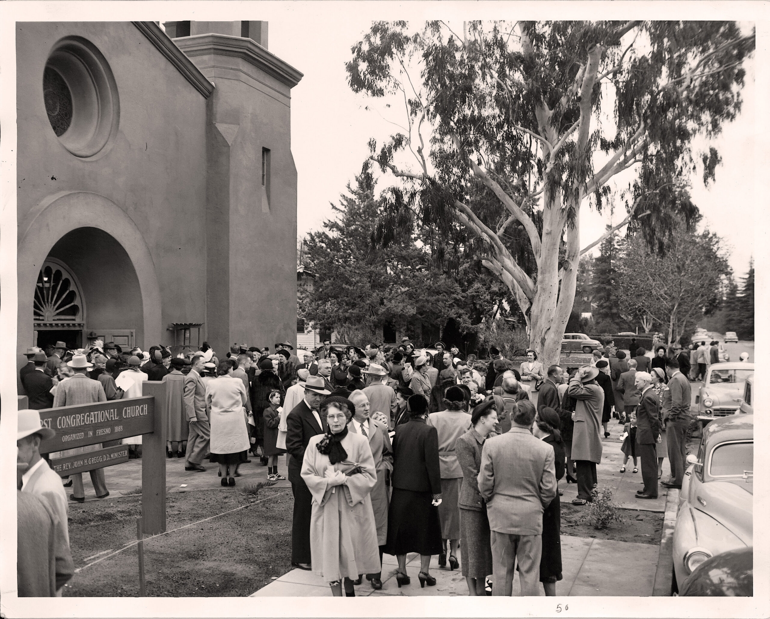 Black and white photograph circa 1949 showing congregation gathered outside First Congregational Church of Fresno at the Van Ness Boulevard location dedication